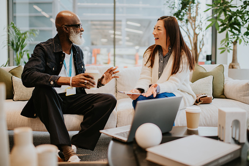 Image of a man and woman in a meeting