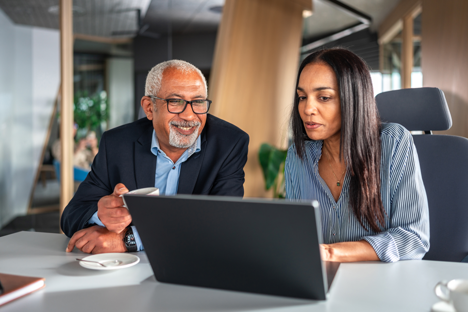 Image of a man and women in a meeting