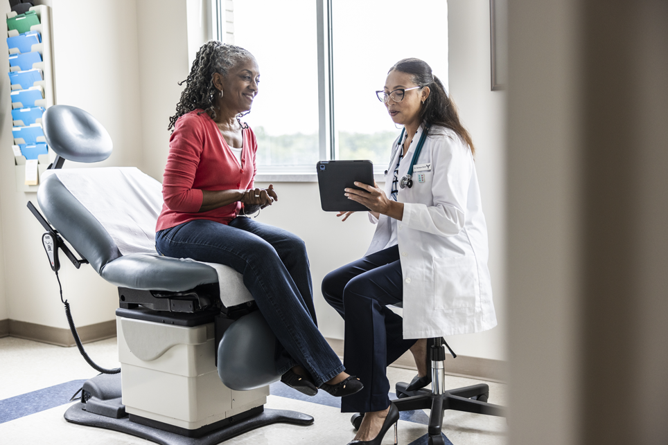 Image of a woman talking with her health care provider