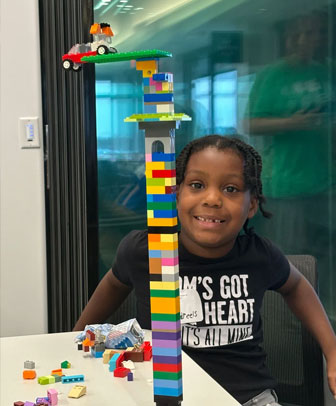 Glen Lake Elementary students with Mortenson hard hats