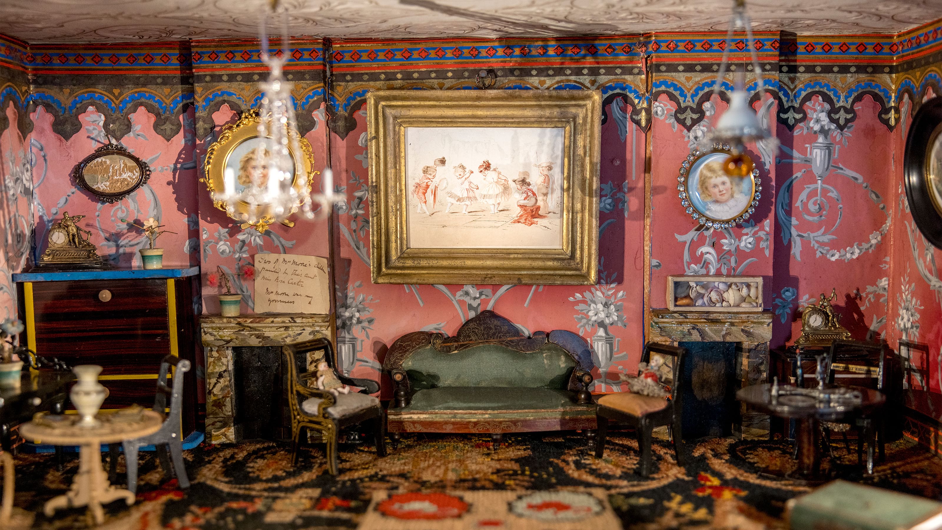 The inside of the Drawing Room within the dolls house with tiny furniture