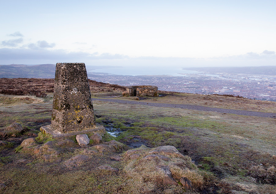 A trigger point on the top of Divis mountain in the foreground with a view over Belfast in the background