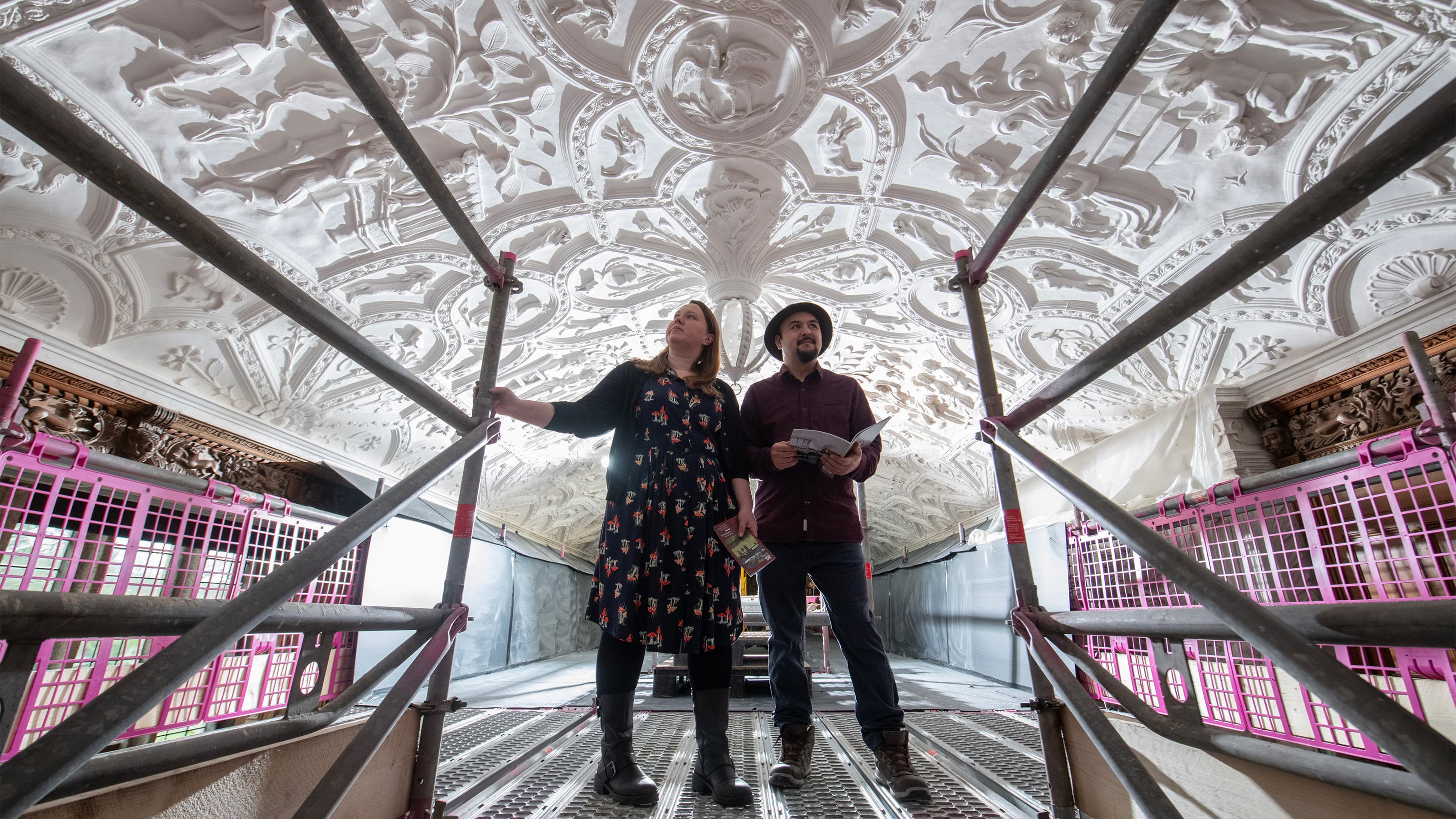 Visitors on scaffolding to view the Long Gallery ceiling at Lanhydrock, Cornwall