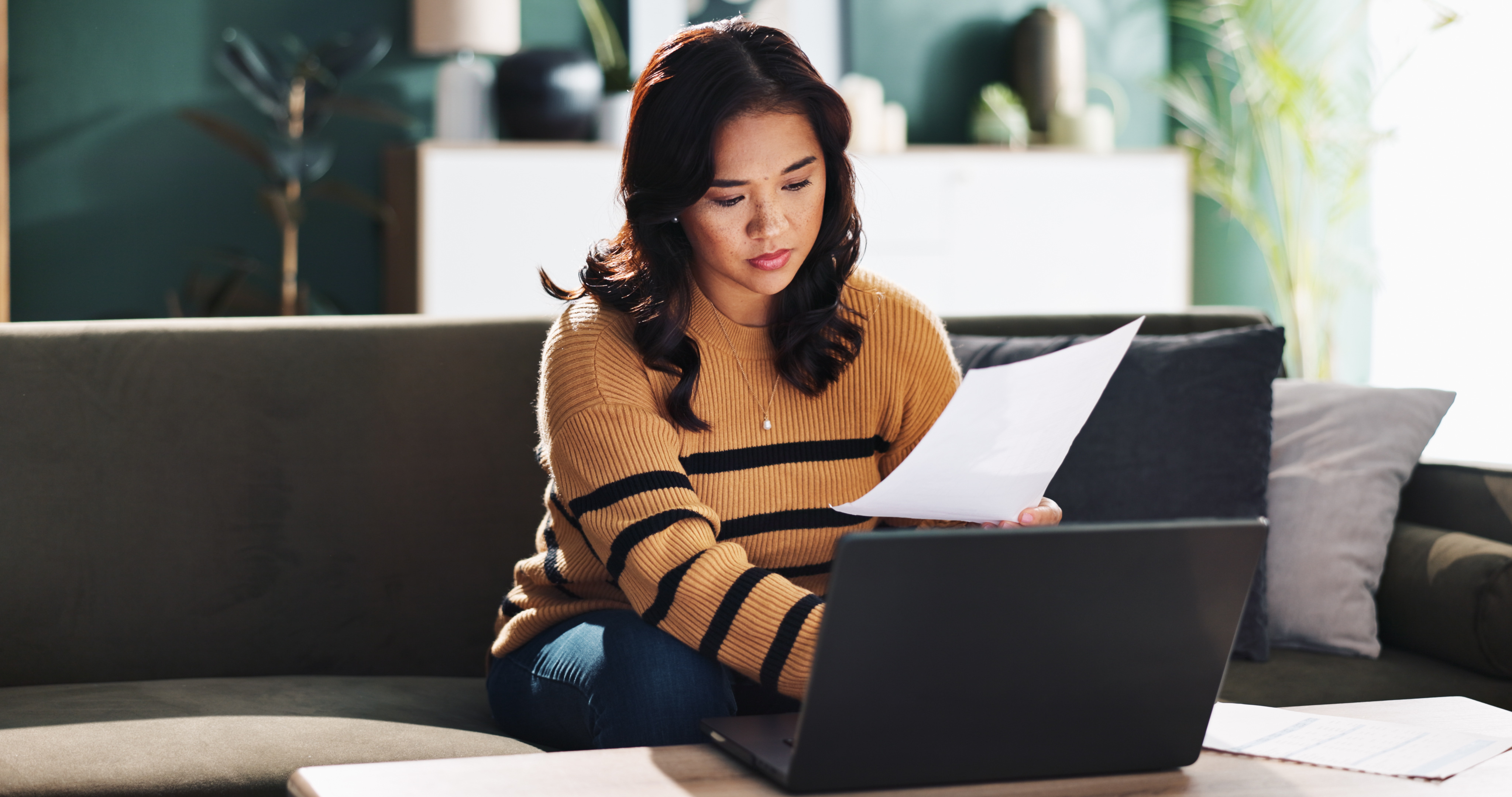 Man presenting to a table or colleagues 