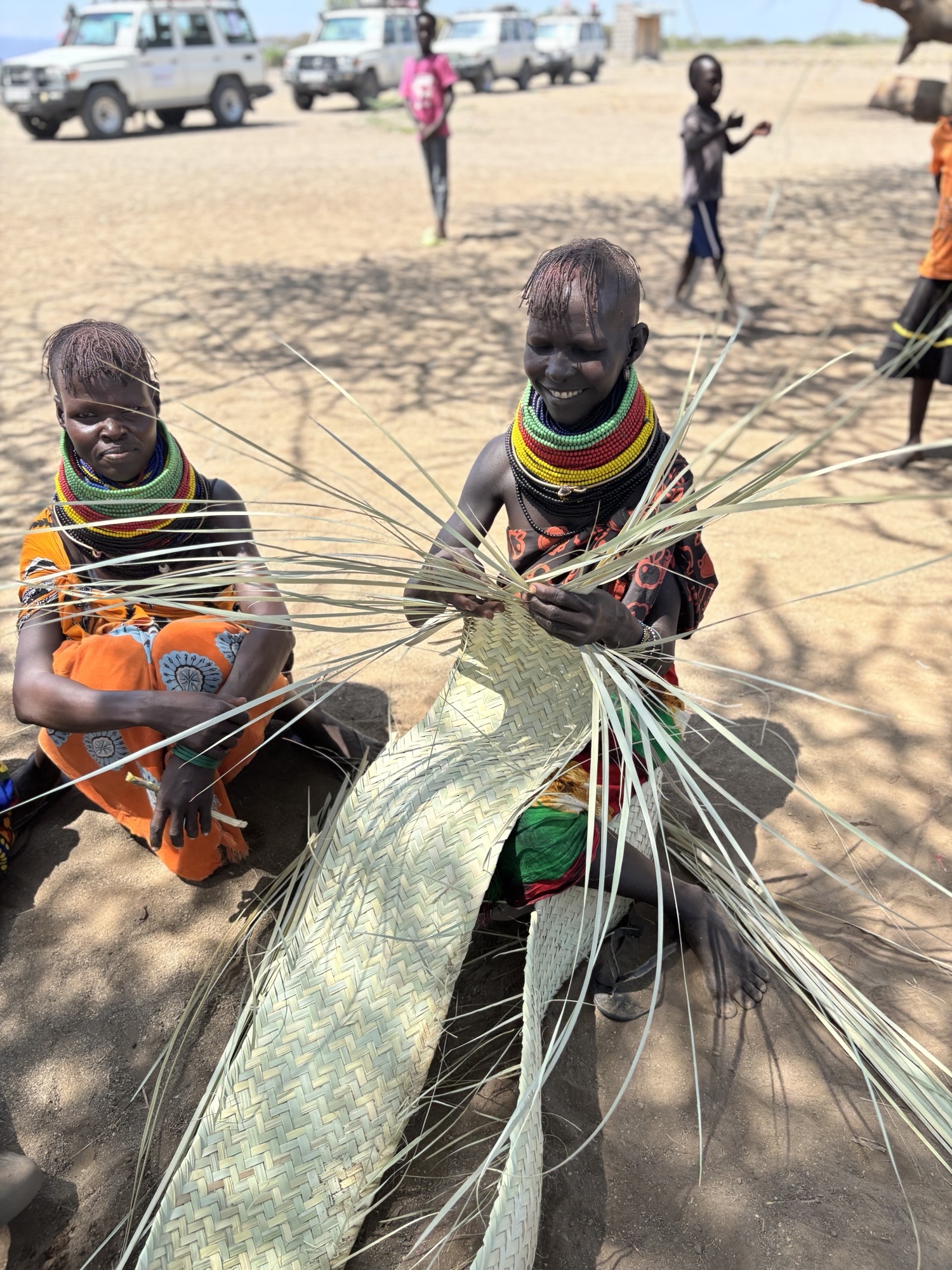 Business colleagues having a meeting in a transparent boardroom. Group of happy business professionals having a discussion during a briefing. Diverse businesspeople collaborating on a new project.