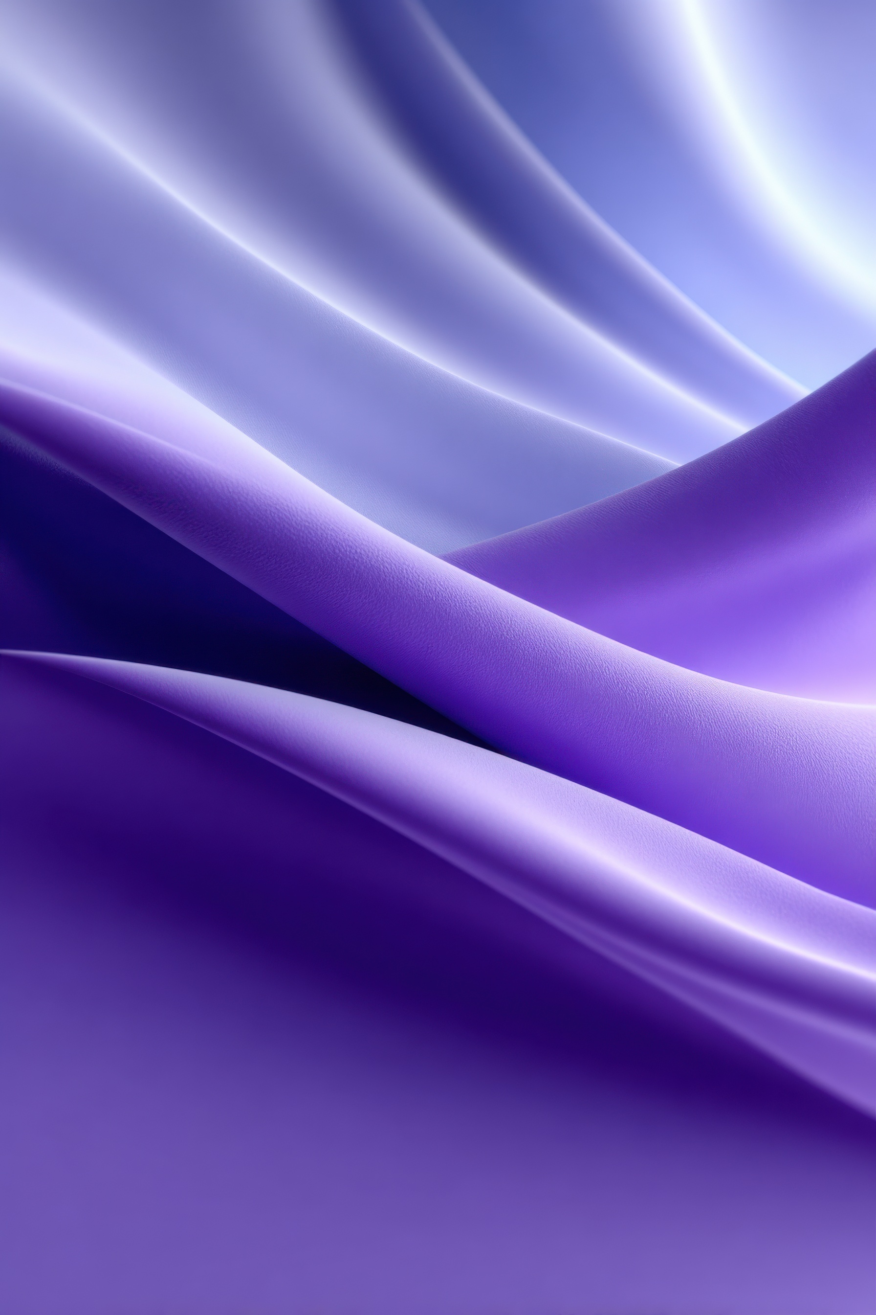 Young brunette woman and a senior lady using their devices while sharing a desk and keeping social distance