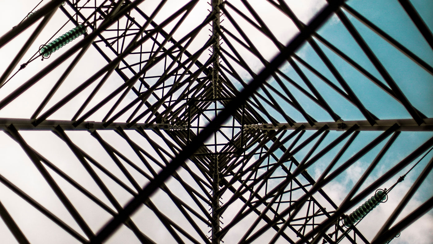 View of power line from underneath of the power line.