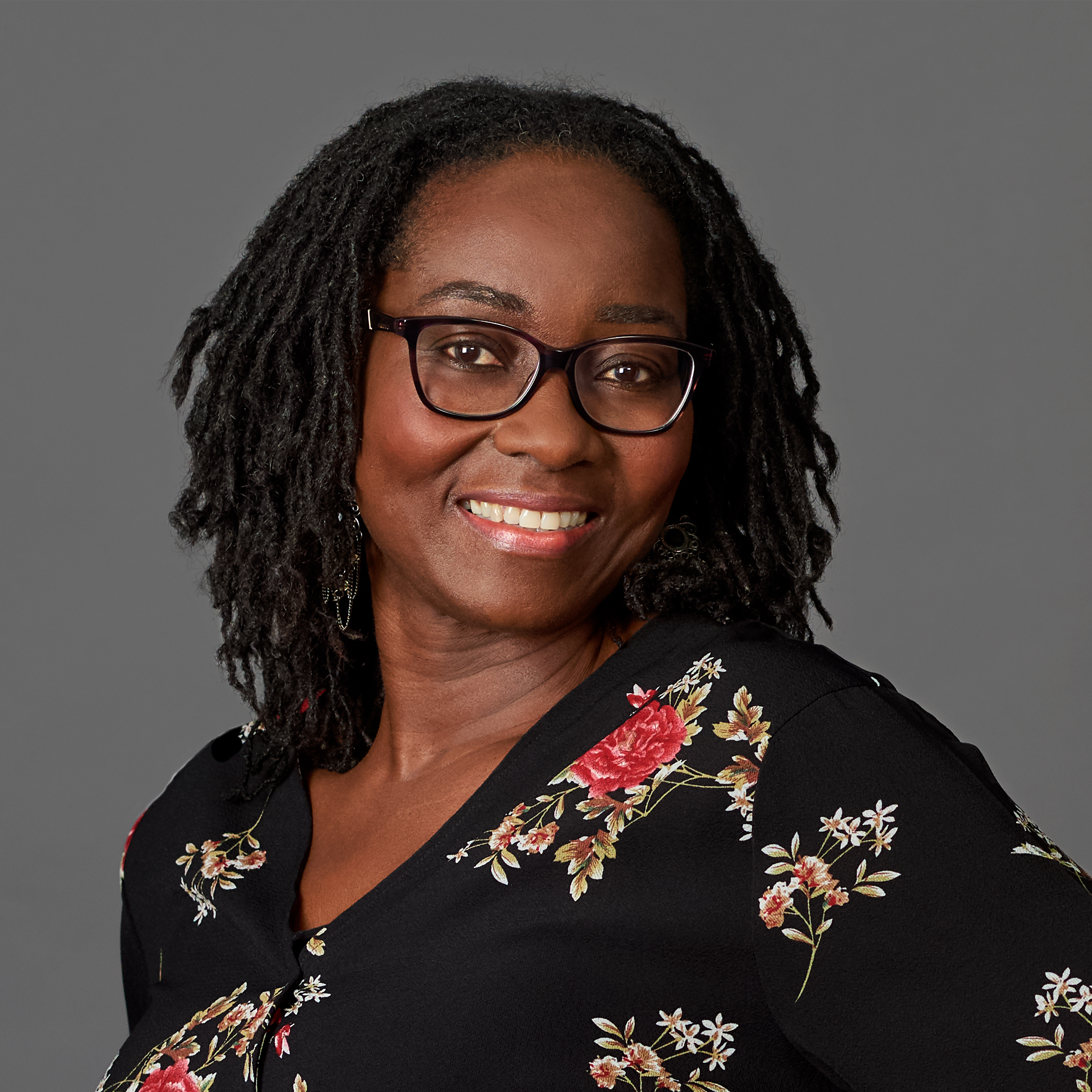 Close up headshot portrait of smiling young Caucasian businessman in glasses posing in office. Profile picture of happy millennial male employee or worker in eyewear at workplace. Employment concept.