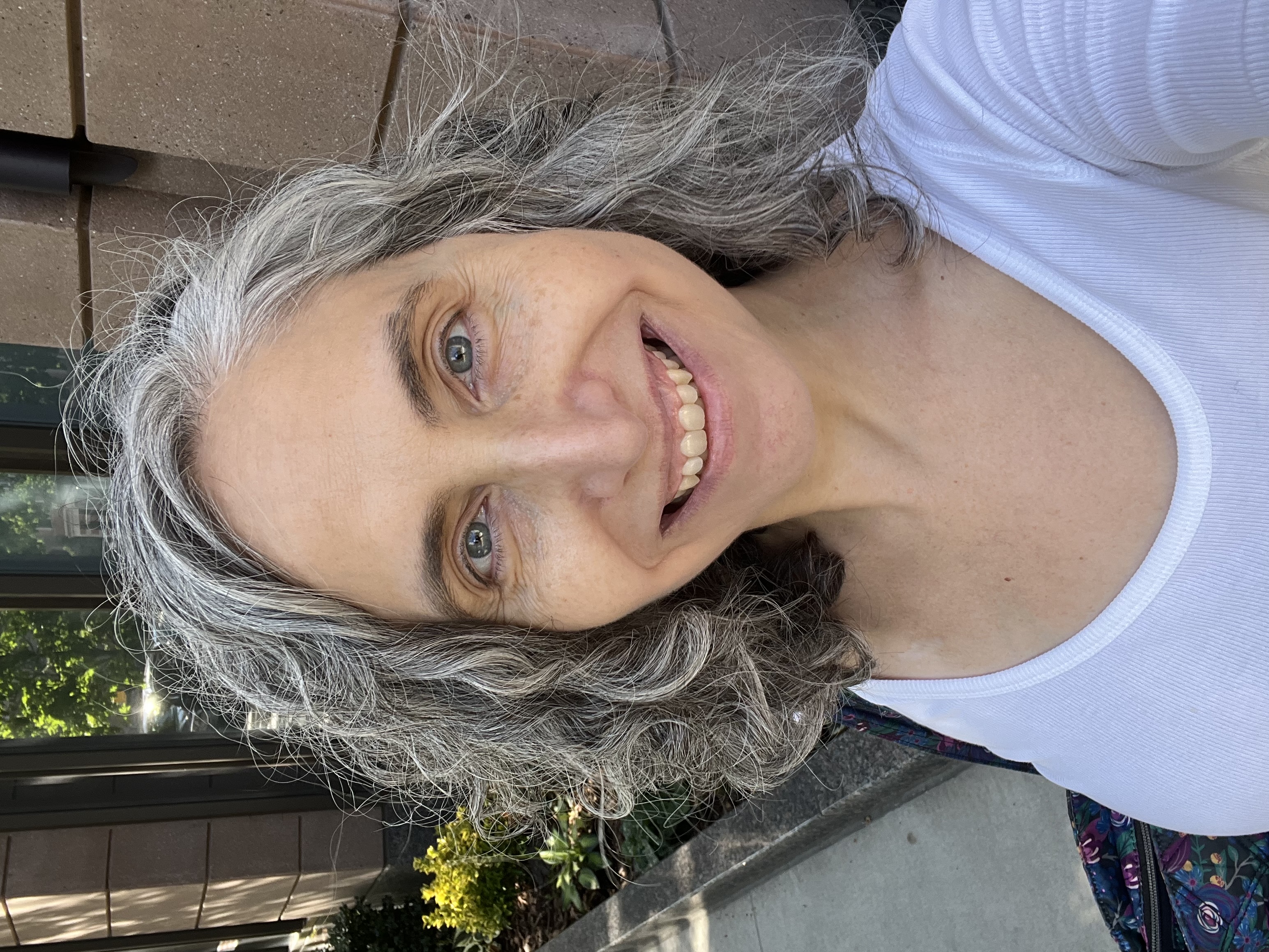 Garam smiles after a recent check-up, during which her gynecologic oncologist told her she had graduated from biannual check-ups to annual visits, September 2024.