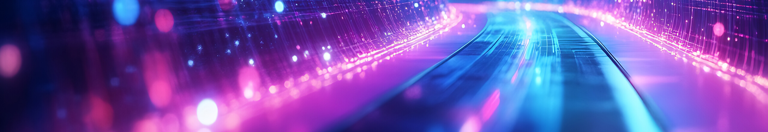 A futuristic, abstract scene with glowing lines and vibrant colors, primarily purples, blues, and pinks. The visual effect suggests a high-speed, digital or technological environment, possibly representing data streams, fiber optics, or a digital highway.