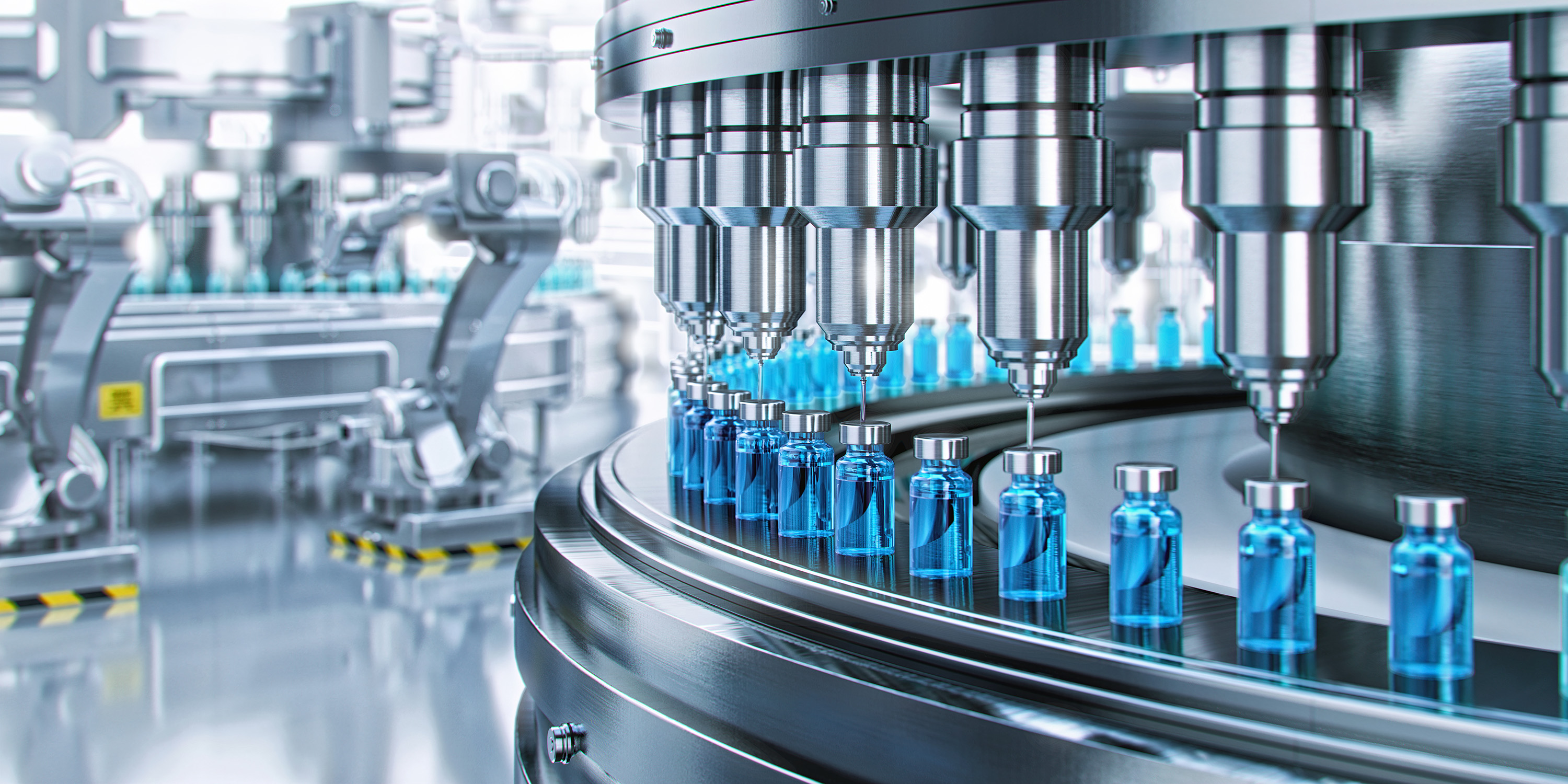 Automated pharmaceutical manufacturing line filling blue liquid medication into glass vials with precision dispensing nozzles