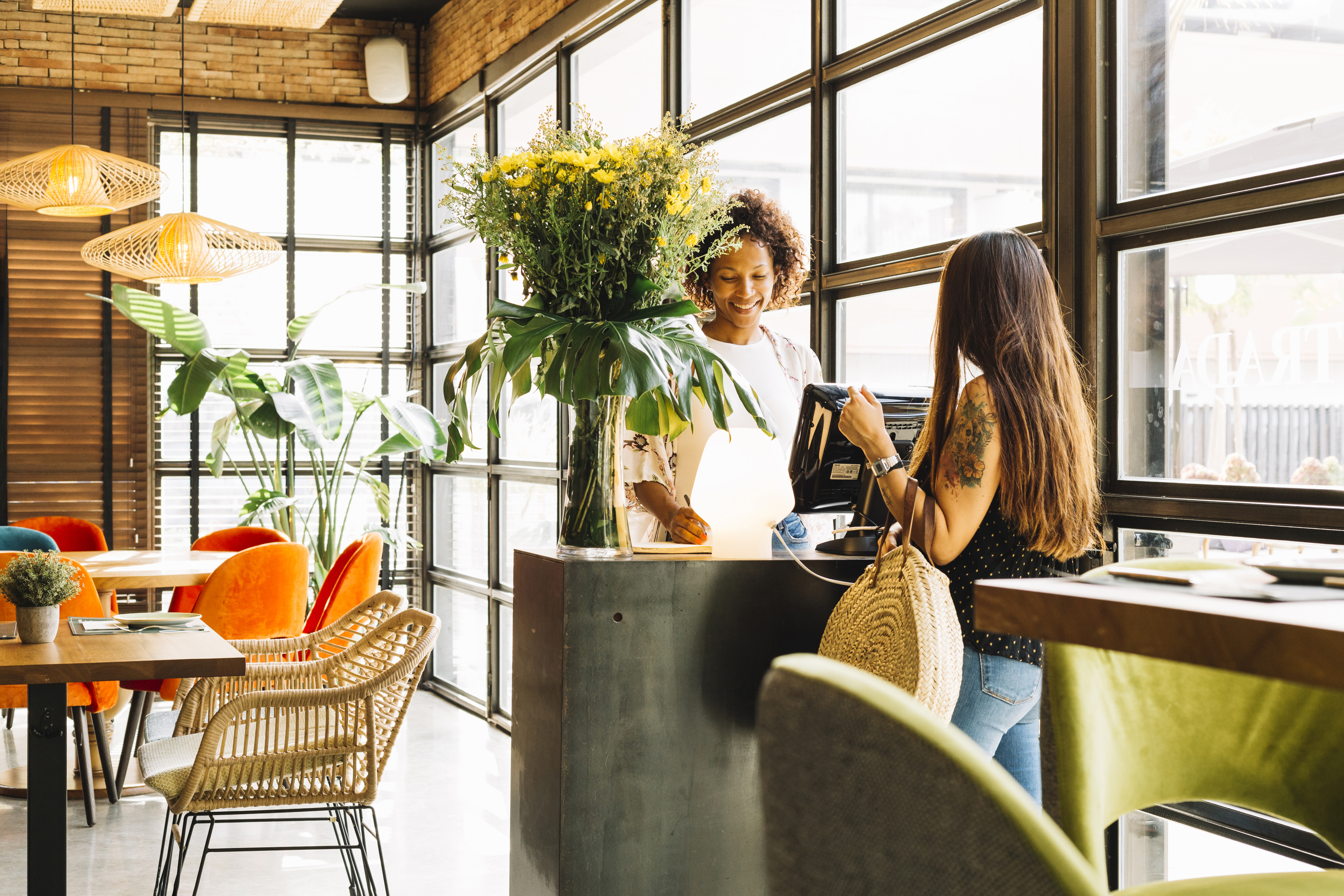 Male manager presenting at informal meeting in a lounge room
