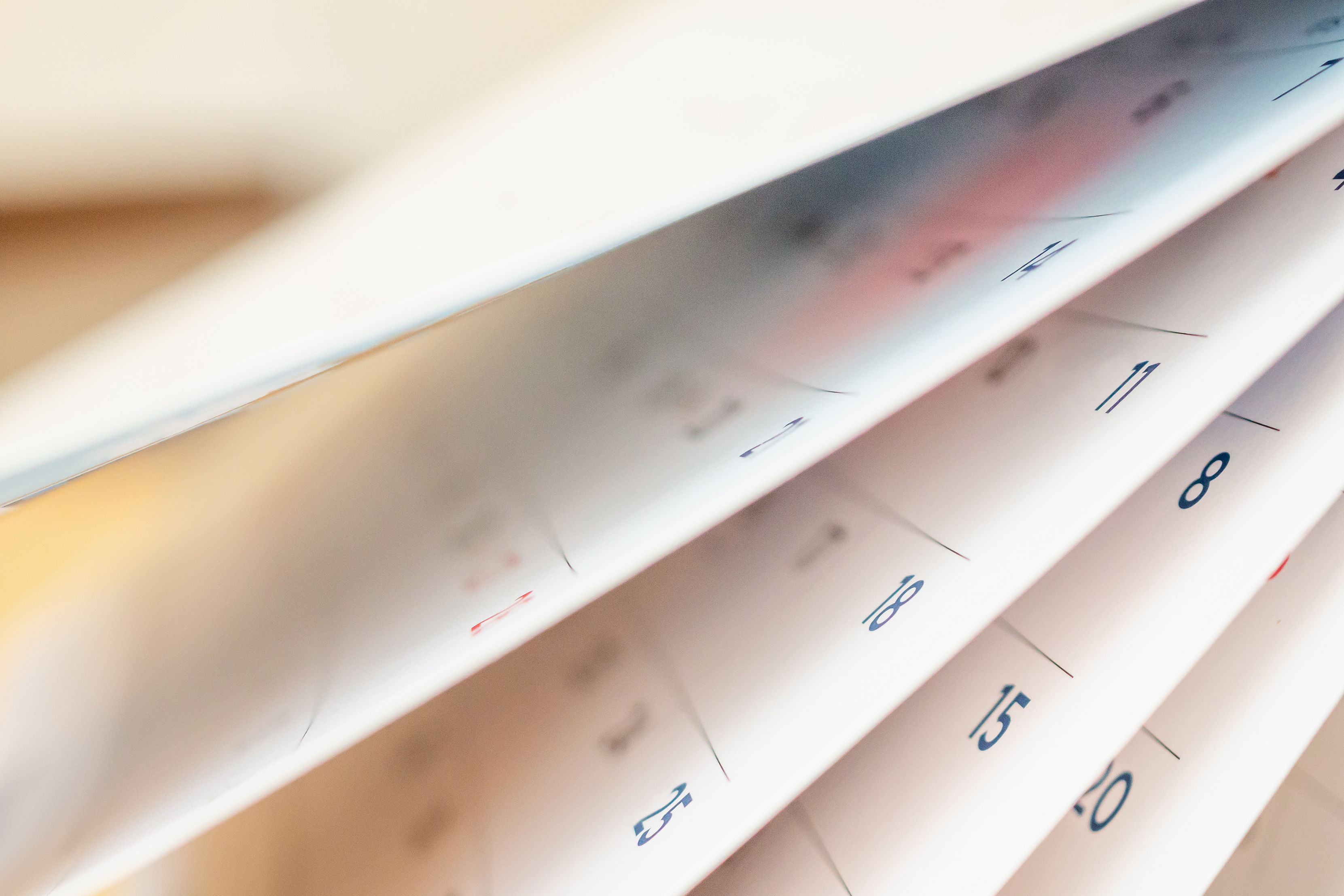 Abstract blur calendar page flipping sheet close up background