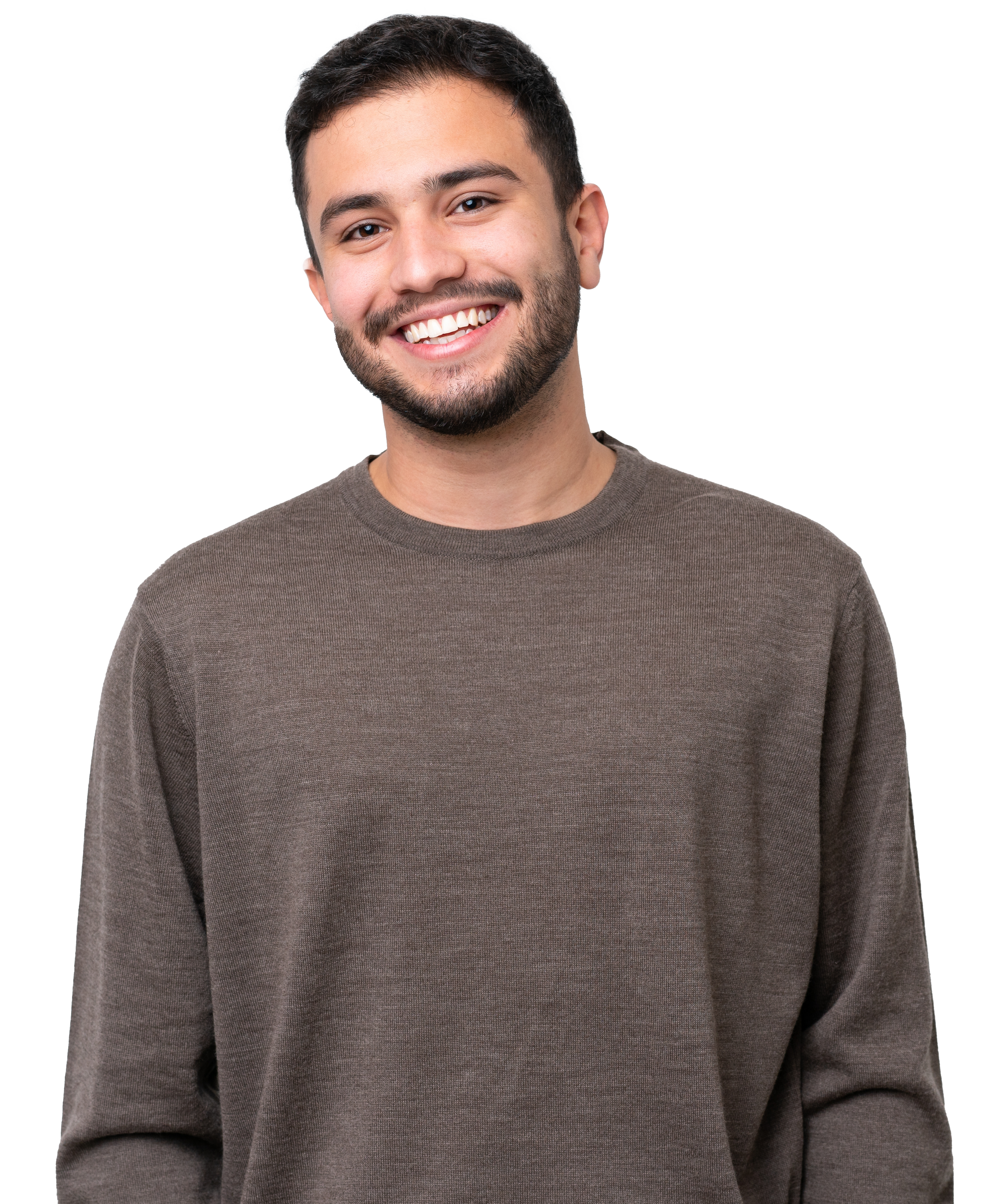 young man with brown hair and beard smiling
