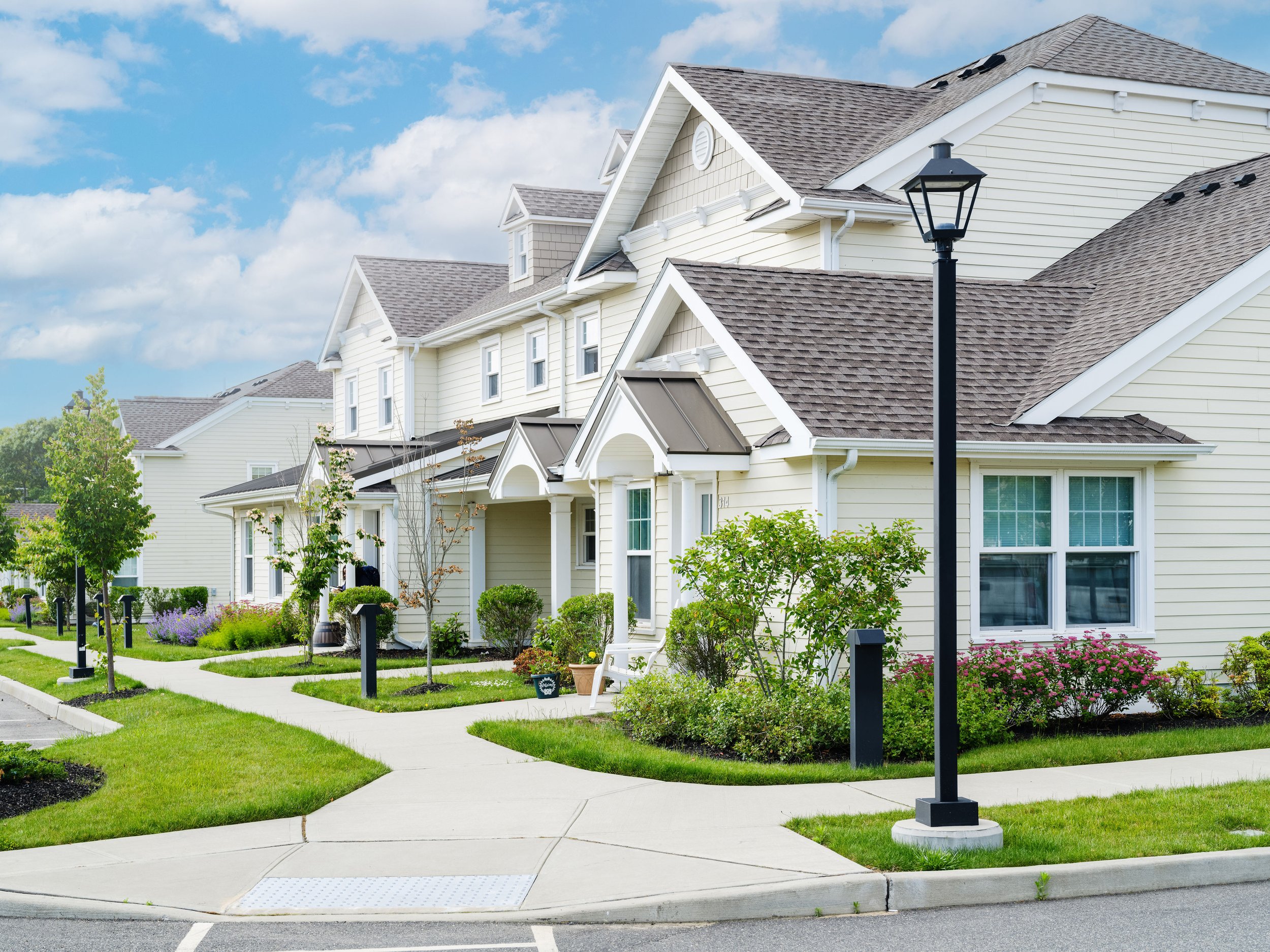 photo of white houses in a neighborhood