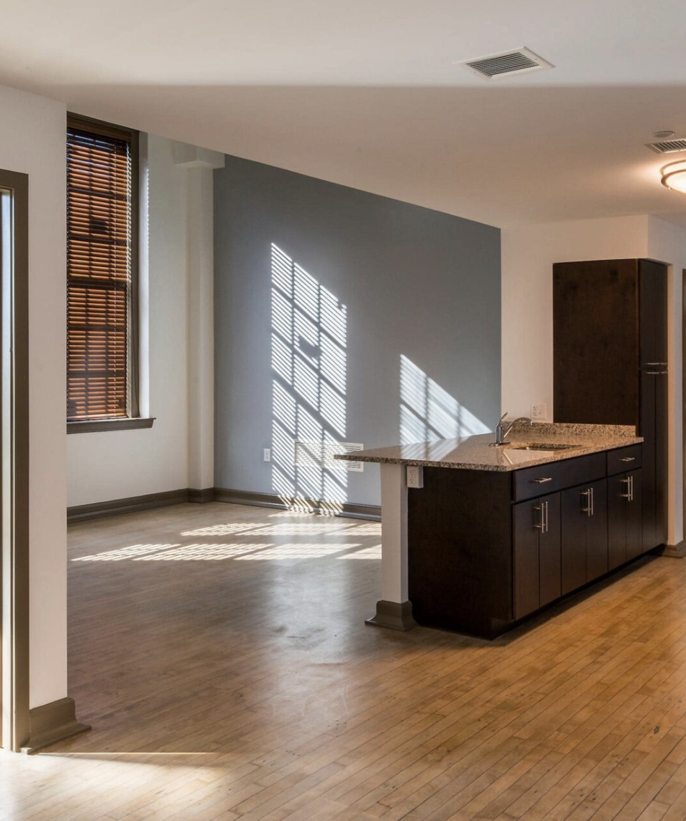 Apartment kitchen with sunny windows