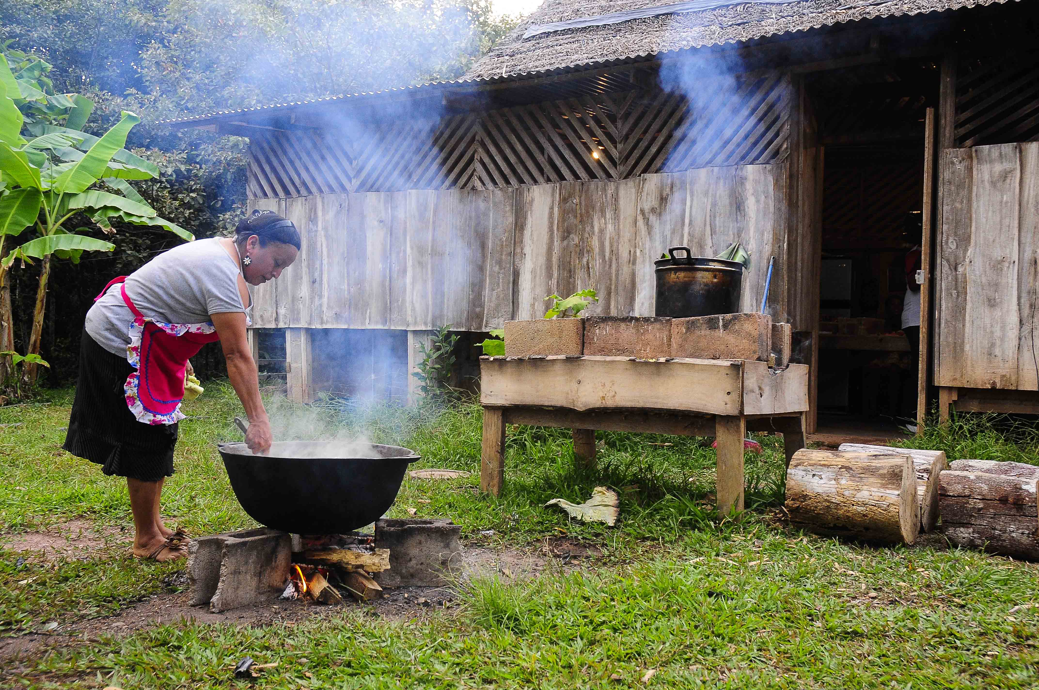 Team of multiethnic architects working on construction plans in meeting room. Engineers and designers discussing project in office. Businesswoman with business team in conference room working on blueprint.