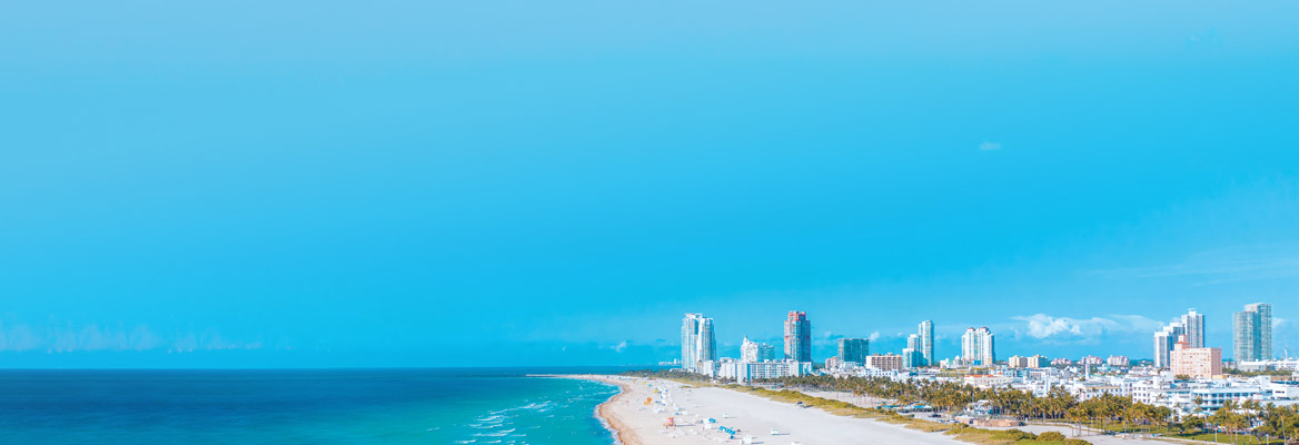 The Miami city skyline where it means the ocean. 