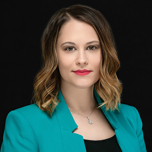 Close up headshot portrait of smiling young Caucasian businessman in glasses posing in office. Profile picture of happy millennial male employee or worker in eyewear at workplace. Employment concept.