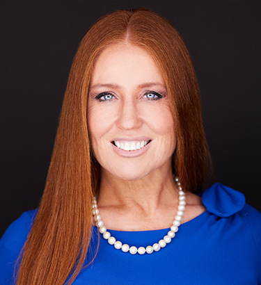 Headshot portrait of smiling young African American businessman in suit pose in own modern office. Profile picture of happy successful male boss or CEO in formalwear show confidence and leadership.