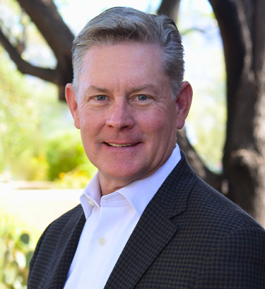 Smiling young african american female student or online teacher tutor looking at camera webcam making distance video conference call for job interview, happy black woman recording vlog, portrait