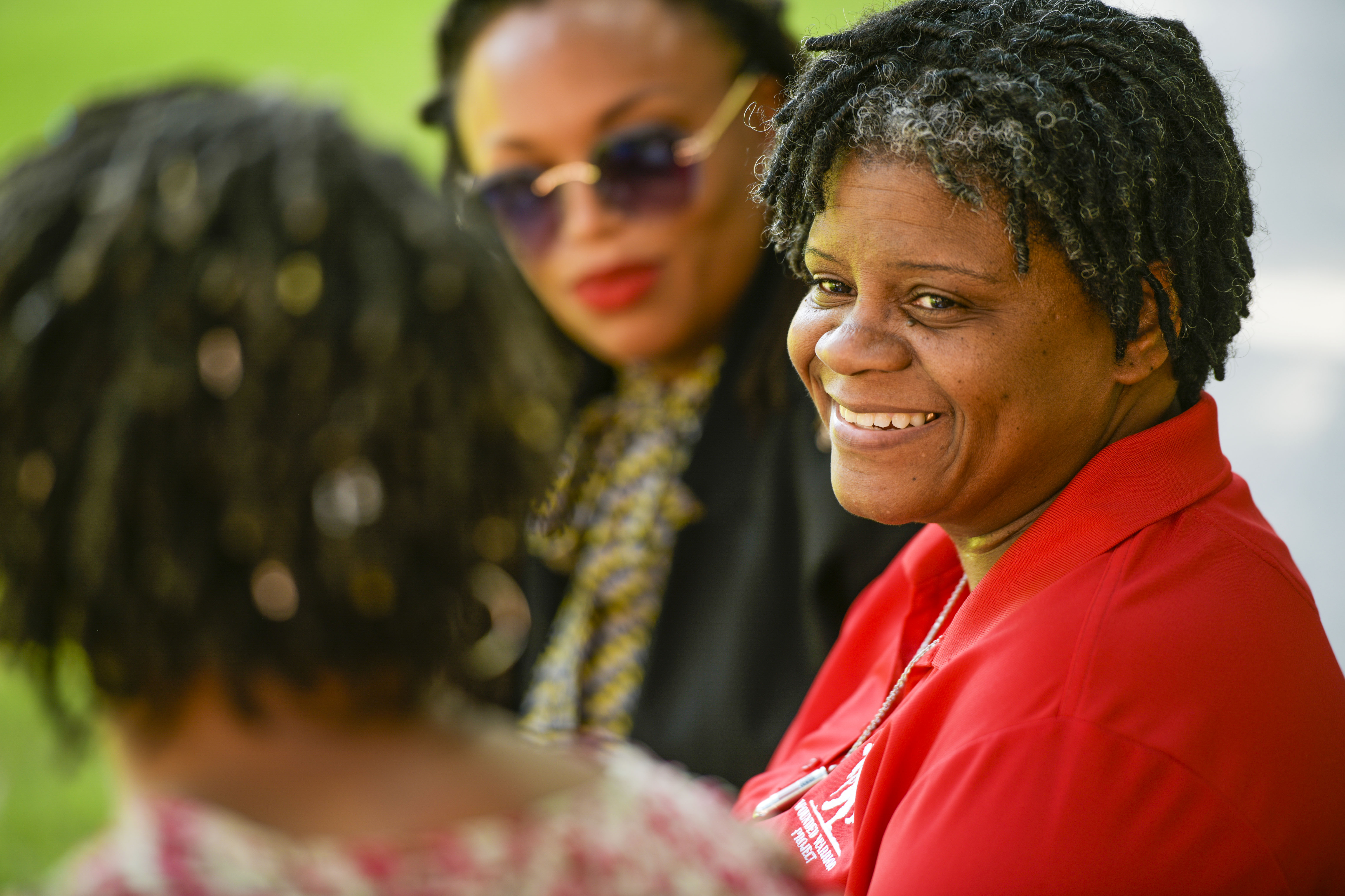 Wounded warrior Sam Hargrove smiles during a group conversation with fellow warriors.