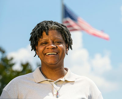 Person sleeping and alarm clock